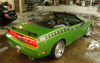 Illustration for article titled Financiapocalpyse Kills One Drop Top Muscle Car, Delays Another